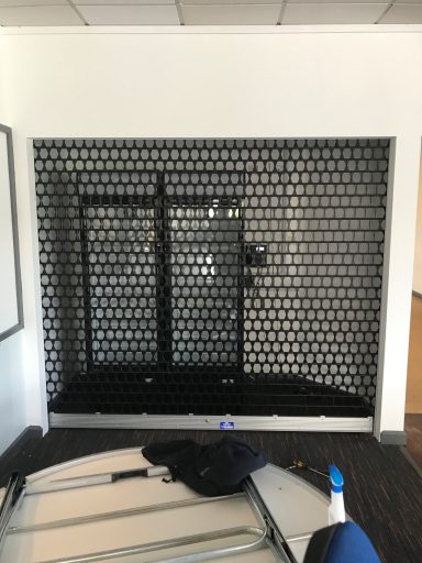 Open grille roller shutter